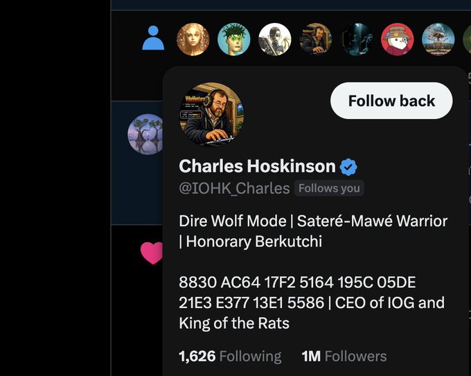 A profile card for Charles Hoskinson (@IOHK_Charles), CEO of IOG and Cardano founder, is displayed with a "Follow back" button, showing 1M followers and a "Follows you" indicator. The card relates to the post as it features the tagged user @IOHK_Charles, welcoming him to the "Bitcoin Capital Layer thesis" with open DMs.