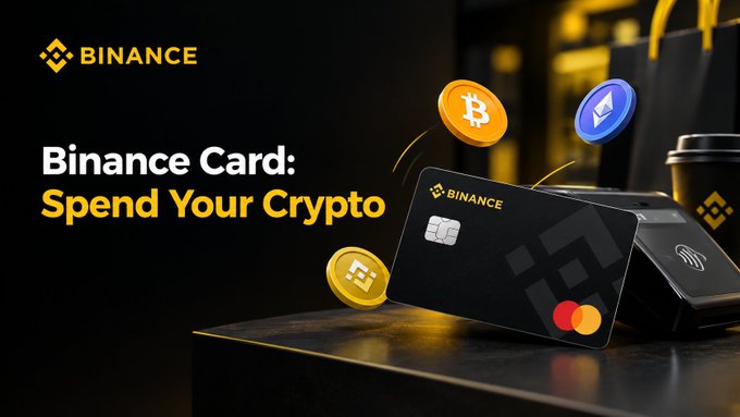 A promotional image for the "Binance Card: Spend Your Crypto" featuring a black Binance-branded debit card with floating Bitcoin, Binance Coin, and Ethereum coins, accompanied by a payment terminal on a dark surface. The visual directly reinforces the post's message about using cryptocurrency for everyday purchases like coffee and online shopping, illustrating the card's practical real-world utility beyond trading.