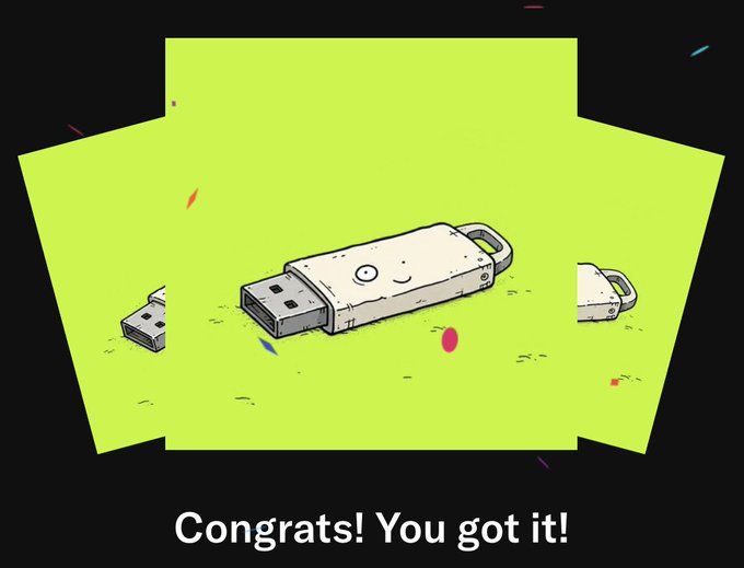 An illustration of a smiling USB drive on a bright green background with the text 'Congrats! You got it!' displayed below.