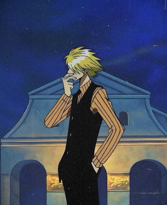 An anime illustration of a blonde-haired male character in a black vest and striped shirt standing in front of a classical building at night under a starry sky.