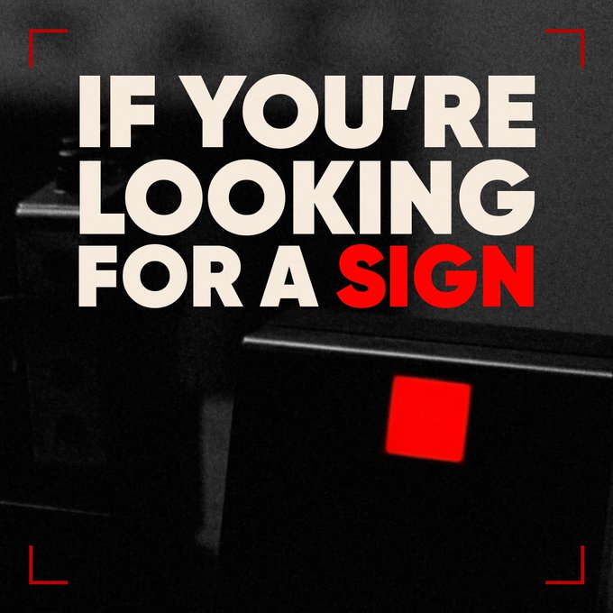 A motivational graphic with bold text reading 'IF YOU'RE LOOKING FOR A SIGN' against a dark background featuring a glowing red square.