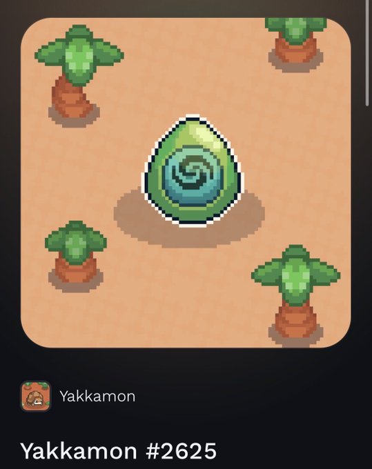 A digital illustration labeled 'Yakkamon #2625' showing a pixel-art green teardrop-shaped creature with a blue swirl pattern on a sandy background surrounded by small palm trees.