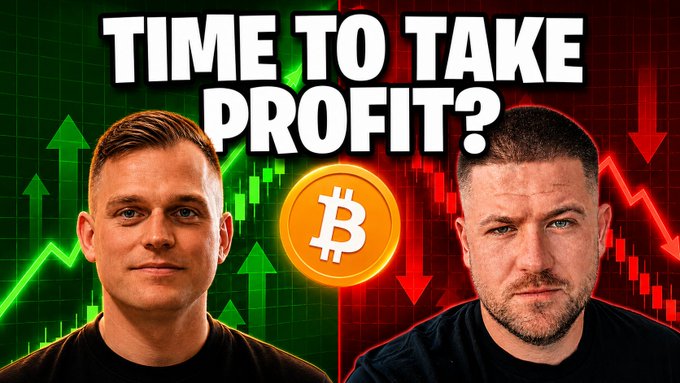 A YouTube thumbnail showing two men with a Bitcoin logo between them and the text "TIME TO TAKE PROFIT?" with green upward arrows and red downward arrows on a stock chart background.