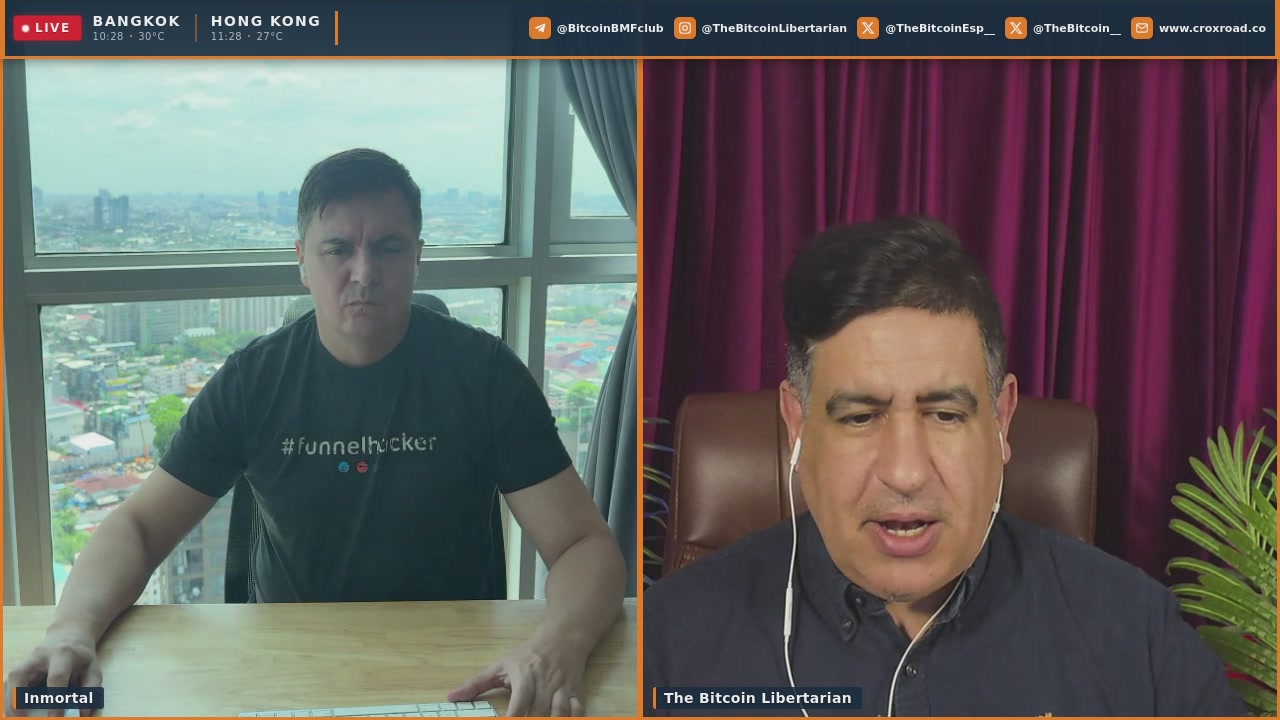 urnnett.com's live video stream features two men, a man in black and a man in blue, seated at a desk with a window view of Hong Kong skyline.