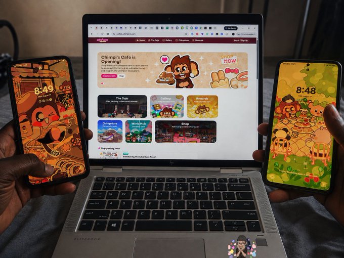 A person holds two smartphones displaying colorful lock screens featuring Chimp & Zee characters, flanking a laptop that shows the 'Chimp's Cafe is Opening!' game webpage.