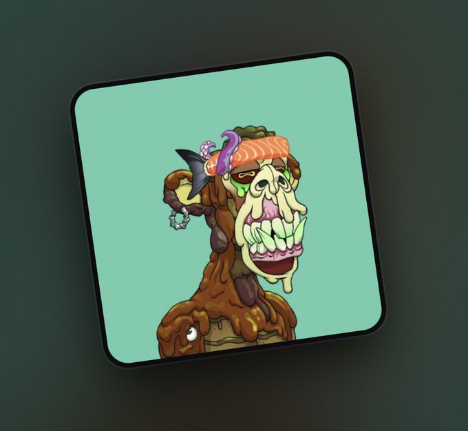 A square coaster or tile features a grotesque cartoon character with bulging eyes, green drool, and a fish on its head, set against a mint green background.