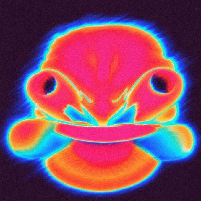 A vibrant thermal/heat-vision style image of Pepe the Frog's face rendered in glowing pink, orange, and blue colors against a dark background.