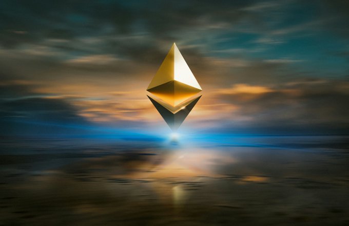 The image features an intriguing scene with a golden triangle-shaped object floating in the air, surrounded by water. The background of the image depicts a cloudy sky, adding depth and atmosphere to the scene. The text "LATEST: A developer used a whitehat exploit to rescue $2 million in ETH locked in a 2016 ICO smart contract for nine years." is present, which seems to be related to the golden triangle floating above the water. This image could potentially be an advertisement or promotional material for a cryptocurrency project or ICO.