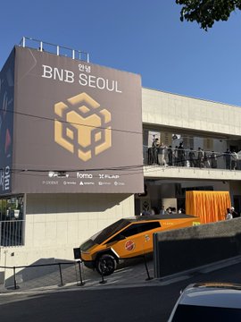 An outdoor shot displays the BNB Seoul venue building, featuring a large banner and a yellow van parked out front while attendees gather on a balcony.
