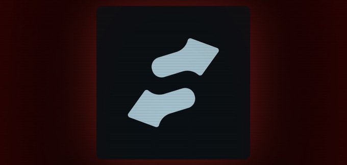A pair of light blue socks on a dark background.
