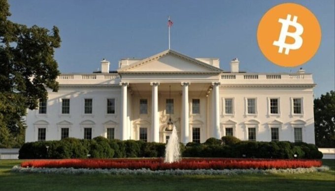 The image shows the White House with an orange Bitcoin logo superimposed in the upper right corner, visually linking the upcoming crypto summit to the official venue where President Trump and industry leaders like Coinbase, Ripple, and Gemini will convene to discuss the CLARITY Act and U.S. crypto regulation.