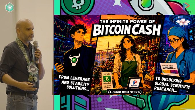 A bald man wearing a sash speaking into a microphone at an event, standing in front of a large screen displaying 'THE INFINITE POWER OF BITCOIN CASH' comic book style artwork with characters and text about leverage, stability, and global scientific research.