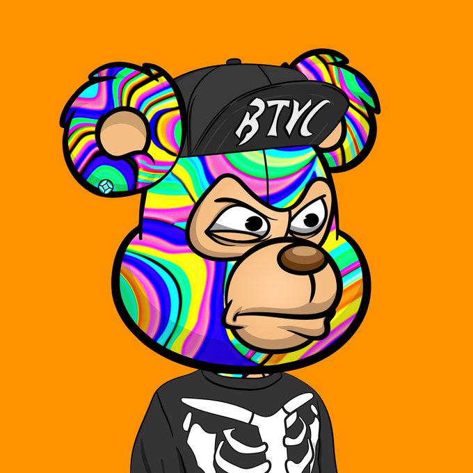 A cartoon bear character with a vibrant, multi-colored psychedelic pattern, wearing a black 'BTYC' cap and a black shirt with a white skeleton design, set against an orange background.