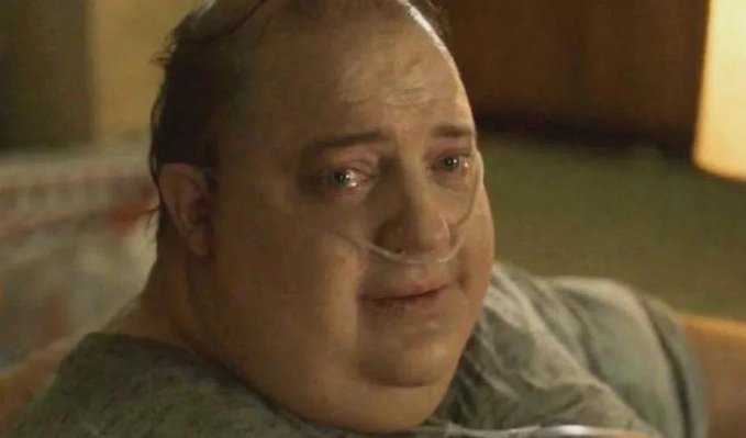 A close-up shows a tearful, heavyset man wearing a nasal cannula, his red eyes conveying deep sadness and exhaustion. The image captures the emotional toll of repeatedly watching XPL fail to break the 10-cent resistance level, mirroring the frustration and defeat of the poster's investment struggle.