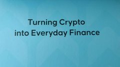 A simple blue graphic with the text 'Turning Crypto into Everyday Finance'.