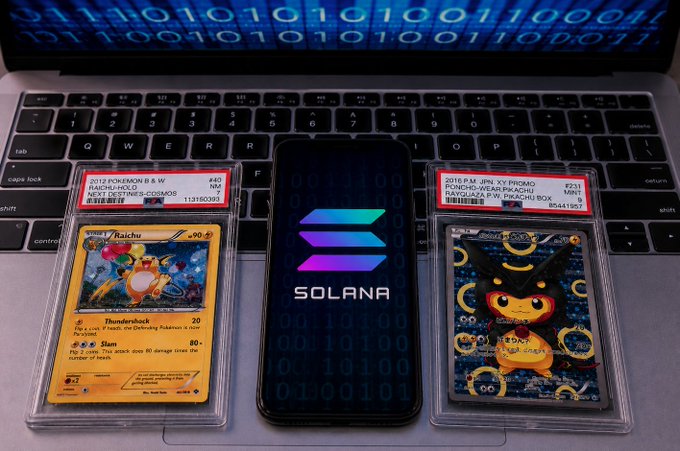 The image shows a laptop with two Pokemon cards placed on top of it, one of which has the word "Solana" written on it. The other card features a cartoon character. The text in the image suggests that the person who posted this photo is interested in collecting Pokemon and wants to share their collection with others.