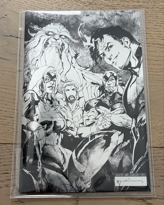 A black and white comic art print featuring several Marvel superheroes including Ms. Marvel, Iron Man, and others, displayed in a plastic sleeve and signed by artist 'Leinil Francis Yu' dated '14'.