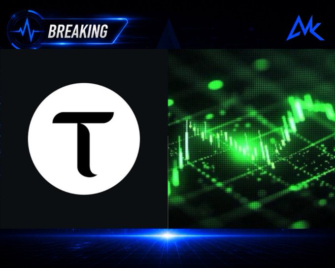 A 'BREAKING' news graphic featuring a circular 'T' logo next to a green digital circuit board pattern.