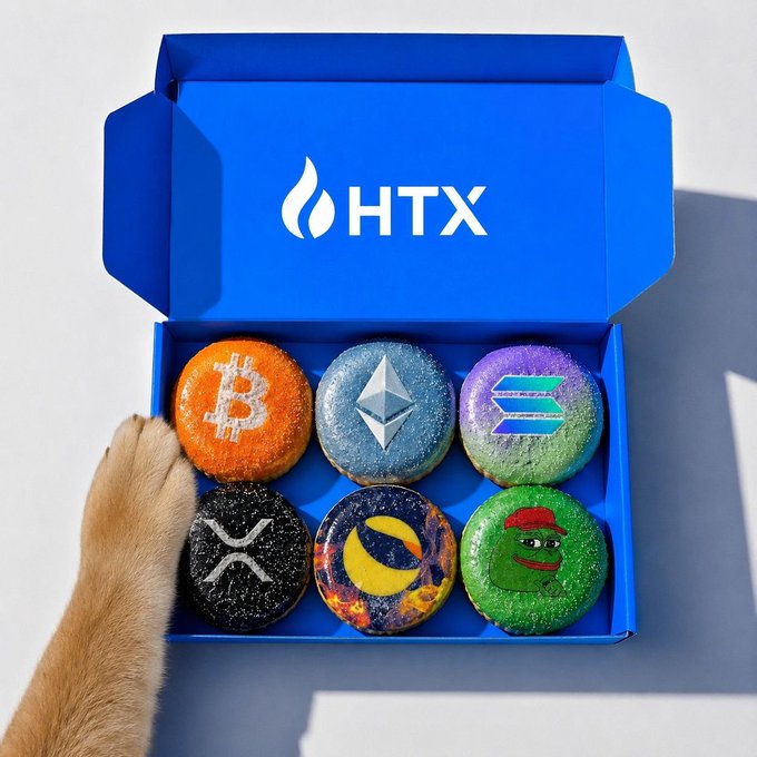 The image features a blue box containing six donuts with various designs, including one that has Bitcoin symbols on it. A dog's paw is seen sticking out of the box, reaching towards the donuts. The caption "Good pick $LUNC" suggests that this particular selection of donuts might be an interesting or unique choice for someone who enjoys a creative twist to their treats.

The image also includes a Bitcoin symbol on one of the donuts and a green frog design on another, indicating that these donuts may have been created with a specific theme in mind. The presence of the dog's paw adds a playful touch to the scene, making it appear as if the dog is excited about the unique selection of treats inside the box.