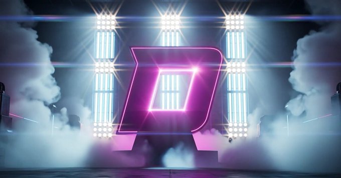 A large image with the letter "D" prominently displayed at the top center of the frame, surrounded by a purple light show. This combination creates an aesthetically appealing and attention-grabbing visual, likely related to the ongoing development or launch of a new product, service, or idea.