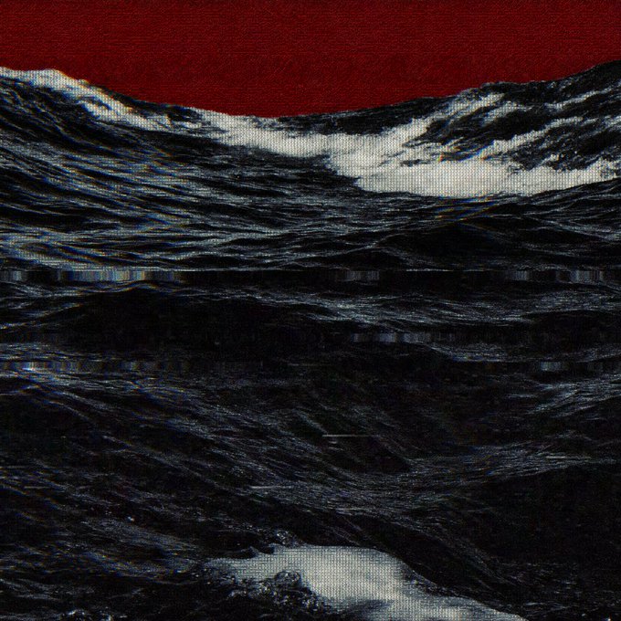 A dark, textured image resembling rough ocean waves beneath a deep red sky, with a canvas-like grain effect.