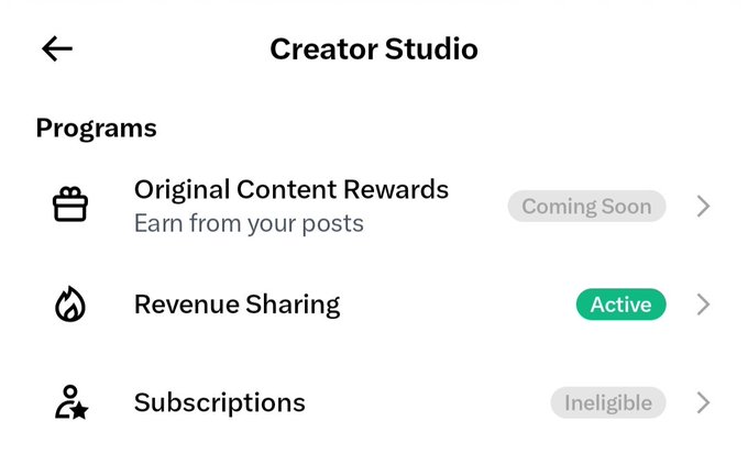 A screenshot of a 'Creator Studio' mobile interface showing a 'Programs' menu with options for 'Original Content Rewards' (Coming Soon), 'Revenue Sharing' (Active), and 'Subscriptions' (Ineligible).