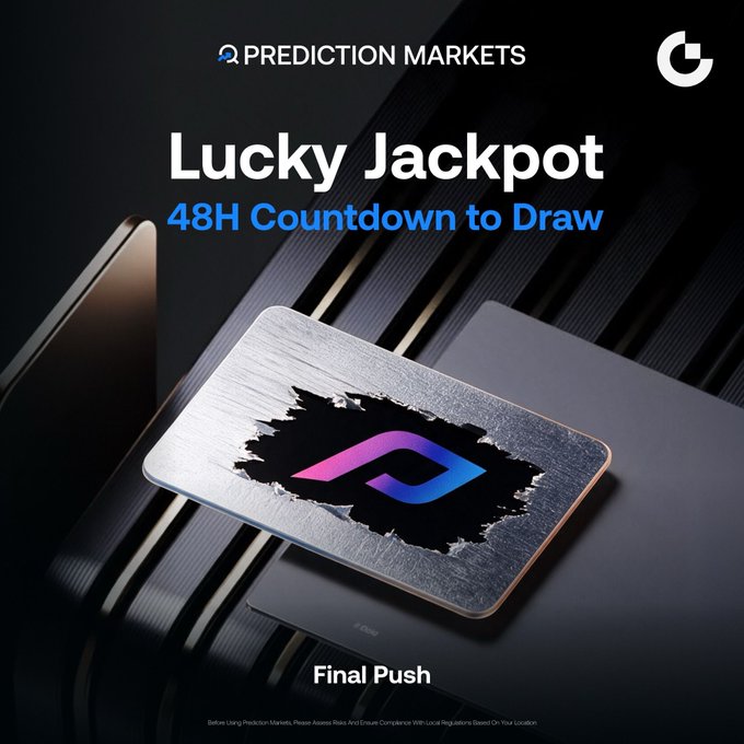 A promotional graphic for Prediction Markets' "Lucky Jackpot" features a silver scratch card with a torn center revealing a colorful gradient logo, set against a dark, sleek background with gold accents. Bold text announces a "48H Countdown to Draw" with "Final Push" messaging, visually reinforcing the post's urgency about the upcoming jackpot reveal and ongoing Event Points leaderboard and Scratch Card rewards.