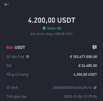 A mobile app screen displaying a completed USDT sell order of 4,200.00 USDT at a rate of ₫24,685.00 per USDT, completed on 2023-12-06 at 13:39:06.