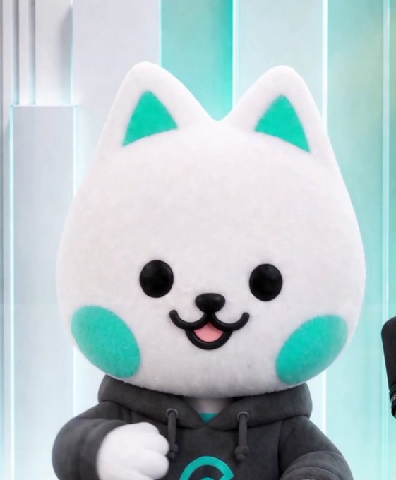 The image features a white cat mascot with teal accents on its ears and cheeks, wearing a dark gray hoodie, which appears to be the CoinEx "Kitty" crypto mascot referenced in the post. The cheerful character ties into the accompanying text about CoinEx Kitty's 90-second crypto news roundup, including BTC's brief push above $81K and rising US ETF activity.