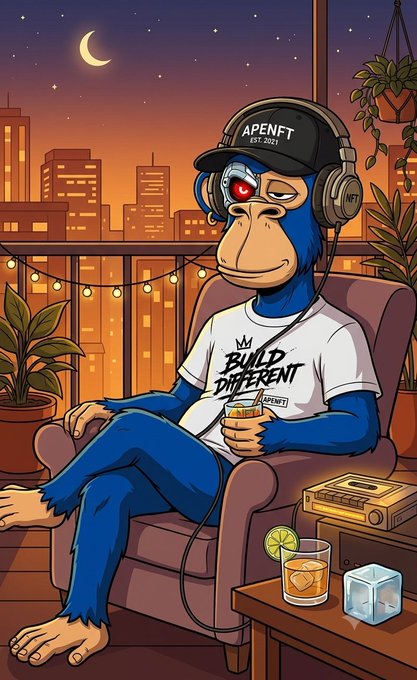 A blue ape wearing an "APENFT" cap and a "BUILD DIFFERENT" t-shirt relaxes on a balcony at night, holding a drink beside a cocktail and an ice cube, with a city skyline and crescent moon in the background. The relaxed evening vibe and "BUILD DIFFERENT" messaging visually echo the post's sentiment about @quipnetwork constructing next-generation quantum computing infrastructure.