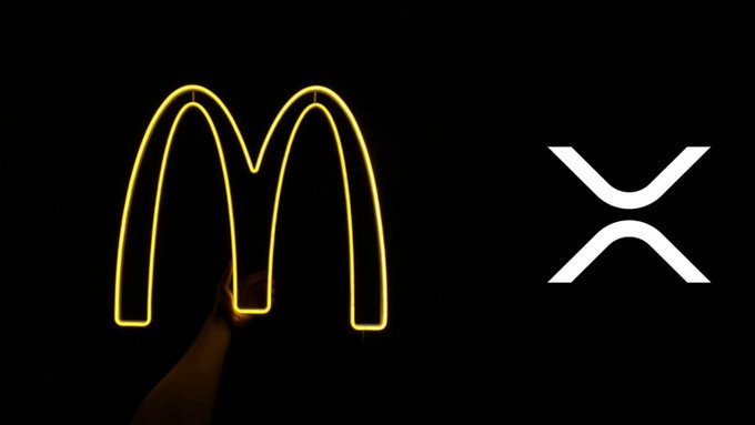 A hand holds up a glowing yellow McDonald's Golden Arches neon sign next to the white XRP (XRP) cryptocurrency logo on a black background, visually pairing the iconic fast food chain with the digital asset as the post claims McDonald's will begin piloting XRP payments.
