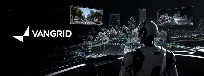 The banner features the VANGRID logo alongside a humanoid robot analyzing urban environments through floating holographic displays showing real-world street scenes and 3D spatial data, visually representing Vangrid's focus on human-collected, real-time ground truth data for physical AI to learn from the physical world.