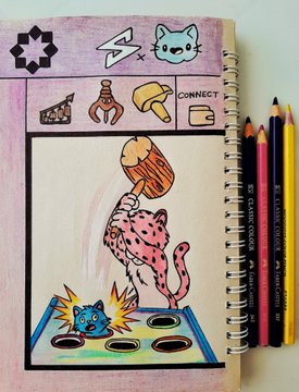 A colorful hand-drawn illustration in a spiral notebook depicting a pink cat character wielding a hammer over a blue toy, with colored pencils resting beside the page.