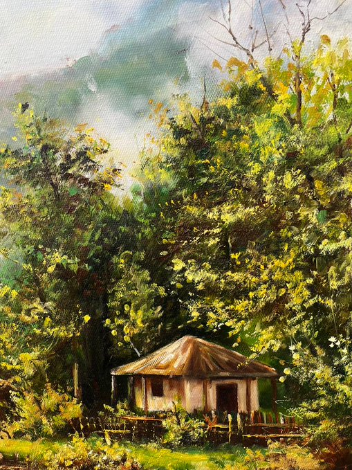 The image features a painting that depicts an old house surrounded by trees, with a wooden fence surrounding the property. The house appears to be made of wood and has a rustic charm. The painting is done in oil on canvas style, giving it a realistic feel. The artist's signature can be seen at the bottom right corner of the image.