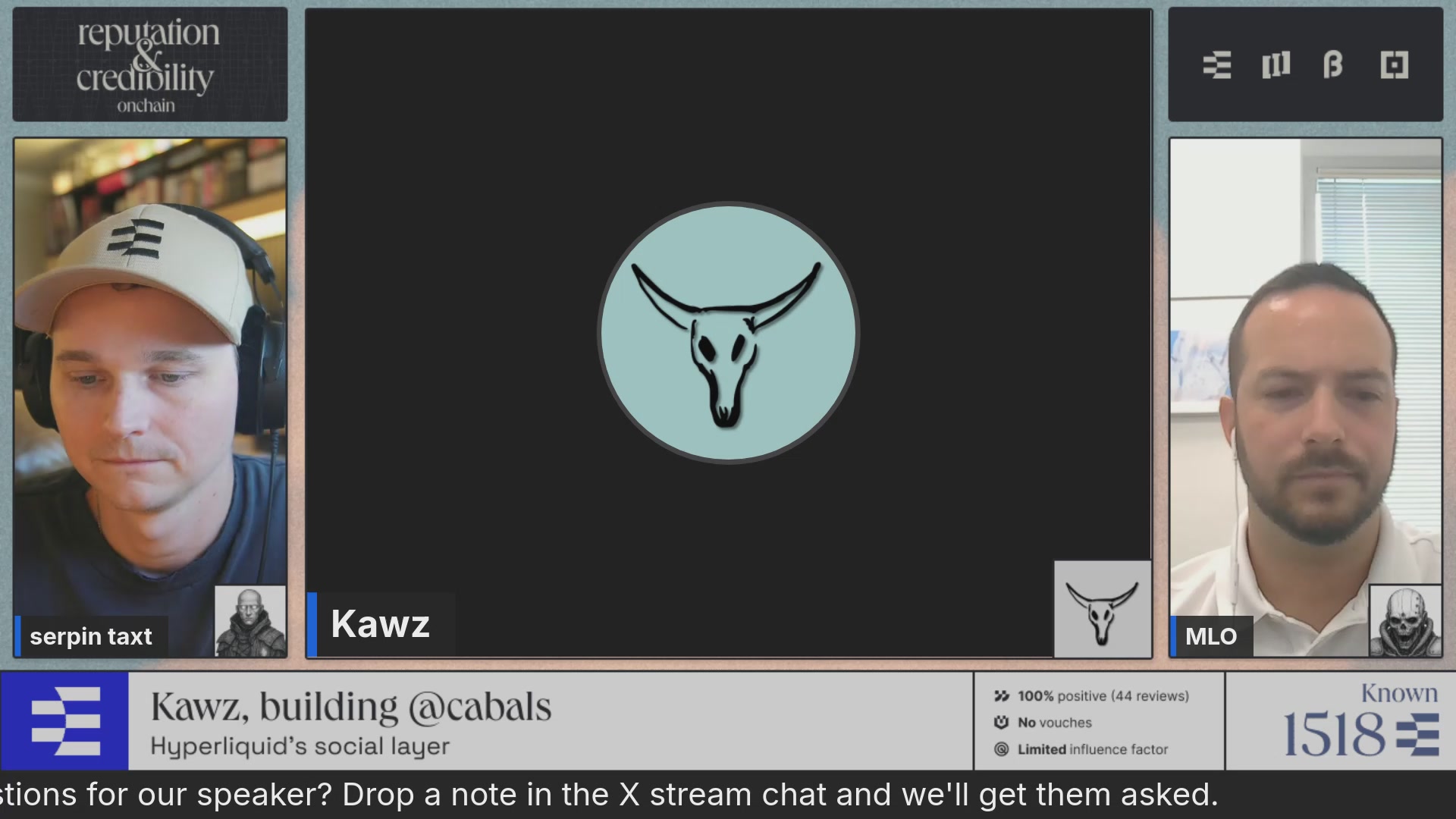 The image shows two men with headphones on their heads, both looking at a computer screen displaying a logo of a skull and crossbones symbol. The text "Kawz Building Caballs" can be seen below the logo. This suggests that they are participating in an online meeting or event where the social layer is being used to facilitate communication among participants.