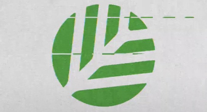A stylized green globe logo with geometric segments is displayed on a white surface.