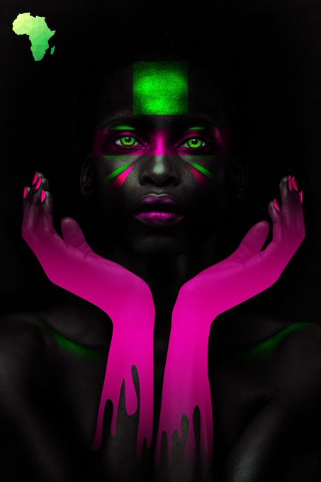 A portrait artwork features a person with glowing green eyes and pink and green face paint, holding pink-painted hands near their face against a dark background with a green Africa silhouette in the corner.