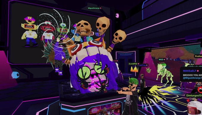 A screenshot from a vibrant, neon-lit virtual reality game or social platform featuring avatars, including one with a large monstrous head with green eyes and another with three skull heads, amid colorful characters and usernames.