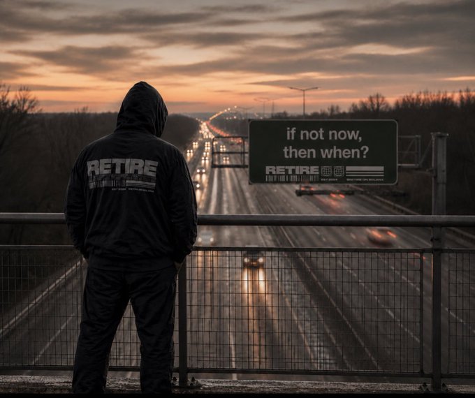 A hooded figure wearing a jacket labeled 'RETIRE' stands on a bridge at sunset, looking at highway traffic, with a billboard reading 'if not now, then when? RETIRE'.