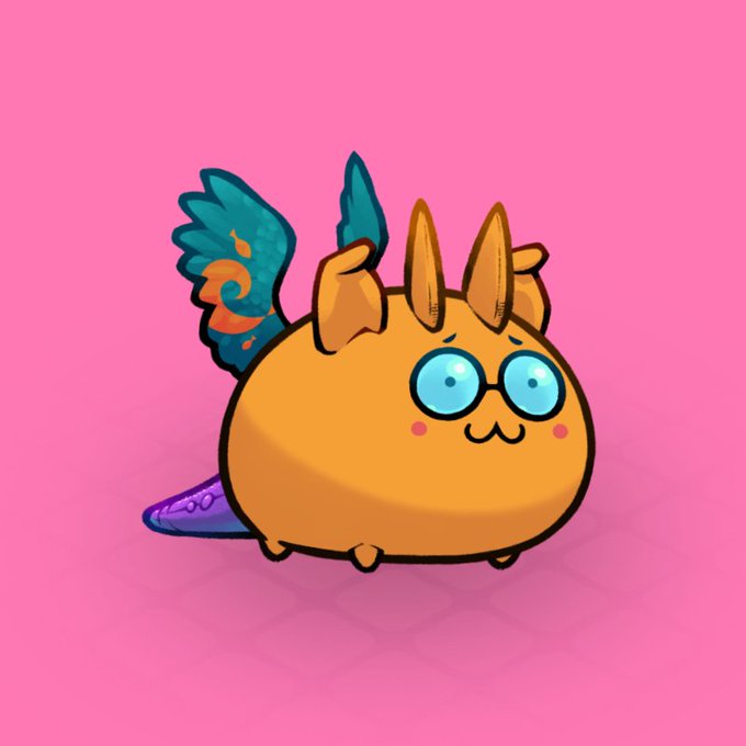 The image features a cartoon animal, possibly an orange fish or a frog-like creature with wings, sitting on top of a pink background. The text "Second Evolution Completed! @kookoocryptotv" indicates that this is the second evolution in the series and "@axieinfinity" refers to Axie Infiniti, which could be a character from the cartoon or an event related to it.