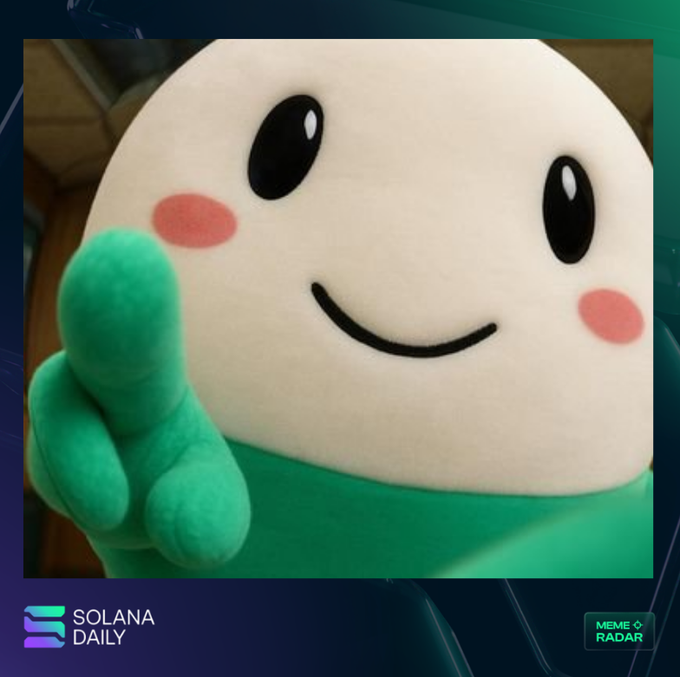 A close-up of a smiling white plush mascot with rosy cheeks giving a thumbs up, with Solana Daily and Meme Radar logos visible at the bottom.