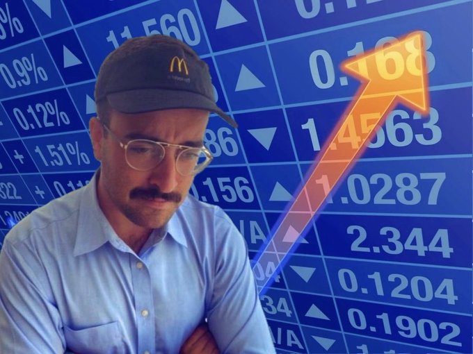 A man wearing glasses and a cap with a McDonald's logo stands with arms crossed in front of a stock market board displaying percentages like "0.99%", "1.51%", and "2.344%" alongside a large upward-pointing orange arrow. The bullish visual mirrors the post's suggestion that investors are not emotionally ready for the October market rally known as "Uptober."