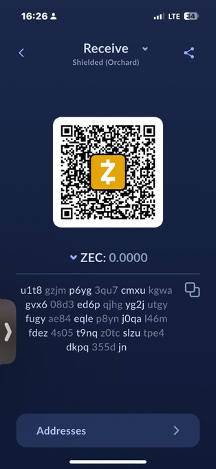 A screenshot of a cryptocurrency wallet app showing a 'Receive' screen for Zcash (ZEC) with a balance of 0.0000, displaying a QR code and a shielded z-address.