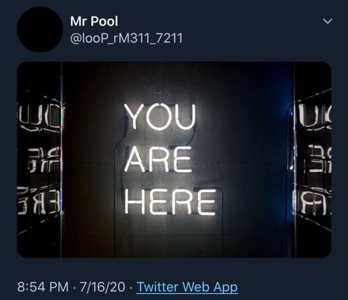 A Twitter post by @_looP_rM311_7211 (Mr Pool) displays a glowing neon sign reading "YOU ARE HERE," reinforcing the caption "The end is just the beginning!" by emphasizing presence and reflection in the present moment.