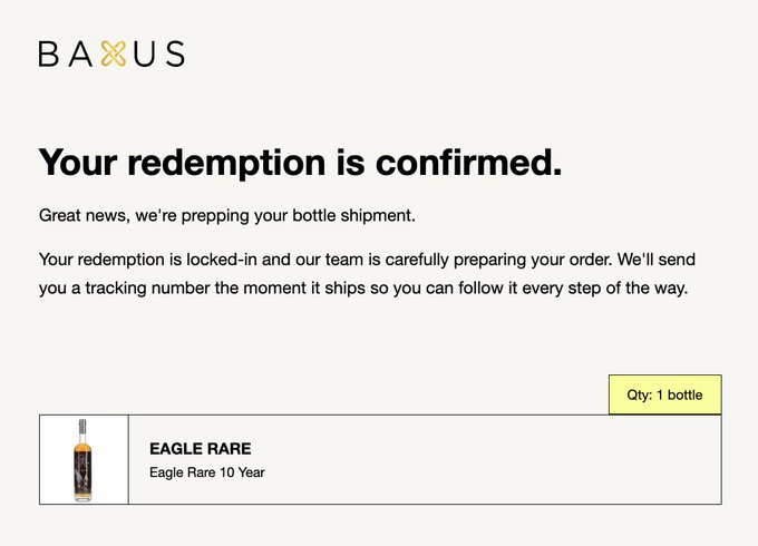 A BAXUS redemption confirmation page stating 'Your redemption is confirmed' for 1 bottle of Eagle Rare 10 Year whiskey.