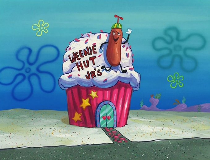 A still from the cartoon SpongeBob SquarePants showing the Weenie Hut Jr's restaurant, designed like a pink cupcake with a hot dog character waving on top.