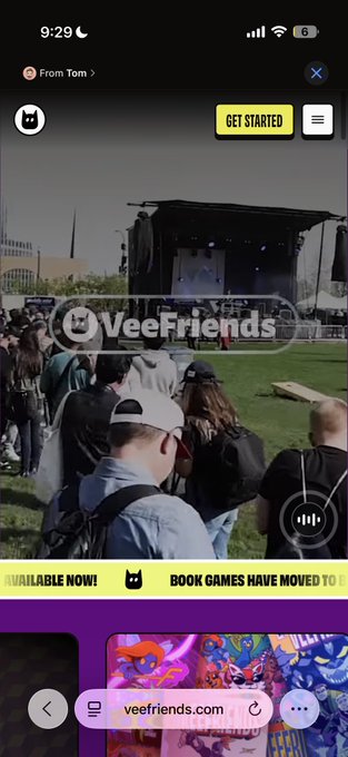 A Snapchat post from "Tom" promotes a new video on veefriends.com, featuring a concert scene with a crowd gathered before an outdoor stage, branded with the VeeFriends logo and a "Get Started" button. The link "veefriends.com" is displayed at the bottom, encouraging viewers to share their perspective in the comments.