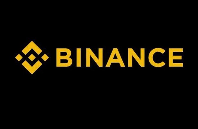 The Binance logo, featuring a geometric yellow diamond icon and the word 'BINANCE' in bold yellow letters against a black background.