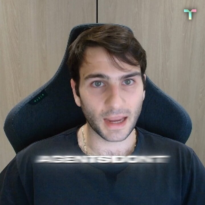 The image shows a man wearing a black shirt sitting in an office chair with his head tilted back. The background features a wooden wall, which complements the man's attire. There are two blurred words visible in the image that read "AI agents don't transact like humans and shouldn'T use human rails. They require parallel execution to scale Talus CEO @0xgmike explains why we're building on @SuiNetwork & leveraging @WalrusProtocol to give agents the speed, memory, & native security they need to operate". The man's posture and facial expression suggest that he is engaged in a conversation or discussion related to artificial intelligence.
