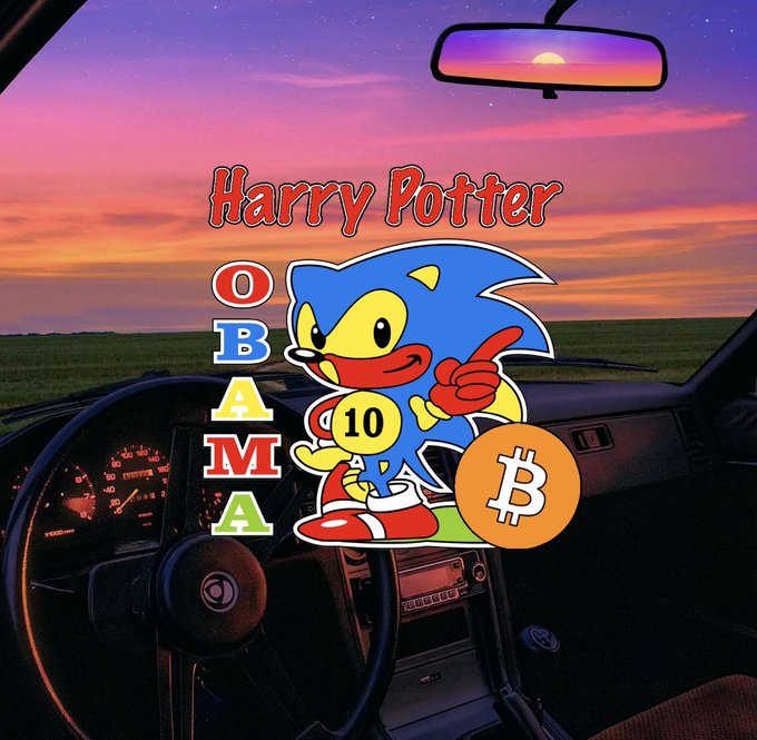 In this image, a car's interior features a steering wheel that displays an advertisement for "Harry Potter". The ad includes a character from the Harry Potter series, Sonic the Hedgehog, who holds a Bitcoin as if he were its owner. The background of the photo is filled with colorful clouds, which contrasts with the dark sky in the upper portion of the image. The phrase "I AM STILL ALL IN I HAVE NO BTC AT ALL ALL I HAVEN IS A FUNKIN BIG BAG OF !" highlights the Bitcoin promotion and adds to the visual appeal of the advertisement.